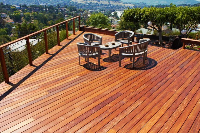 IPE Split level deck with Lighted stairs and stainless steel cable railing contemporary-terrace