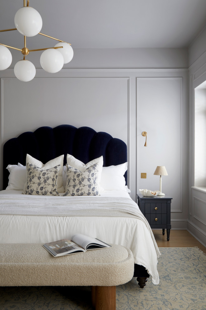 Design ideas for a classic grey and black bedroom in Other.