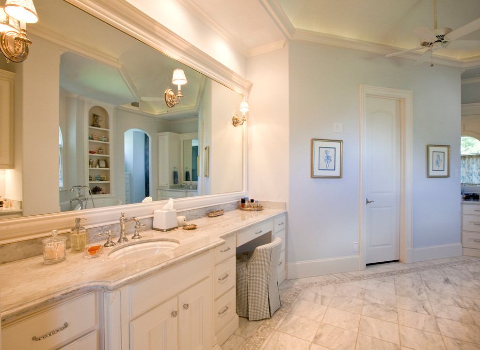 Inspiration for a large traditional master bathroom in Houston with shaker cabinets, white cabinets, a claw-foot tub, black and white tile, gray tile, stone tile, white walls, marble floors, an undermount sink, granite benchtops and beige floor.