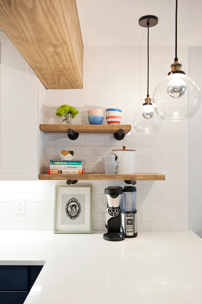 Example of a mid-sized transitional home design design in Austin