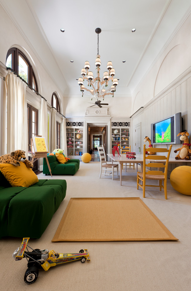 Design ideas for a large traditional gender-neutral kids' playroom for kids 4-10 years old in Miami with white walls and carpet.
