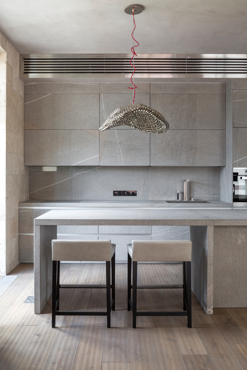 Explore Minimalist Kitchen Ideas with a Touch of Gray Elegance and a Glamorous Chandelier
