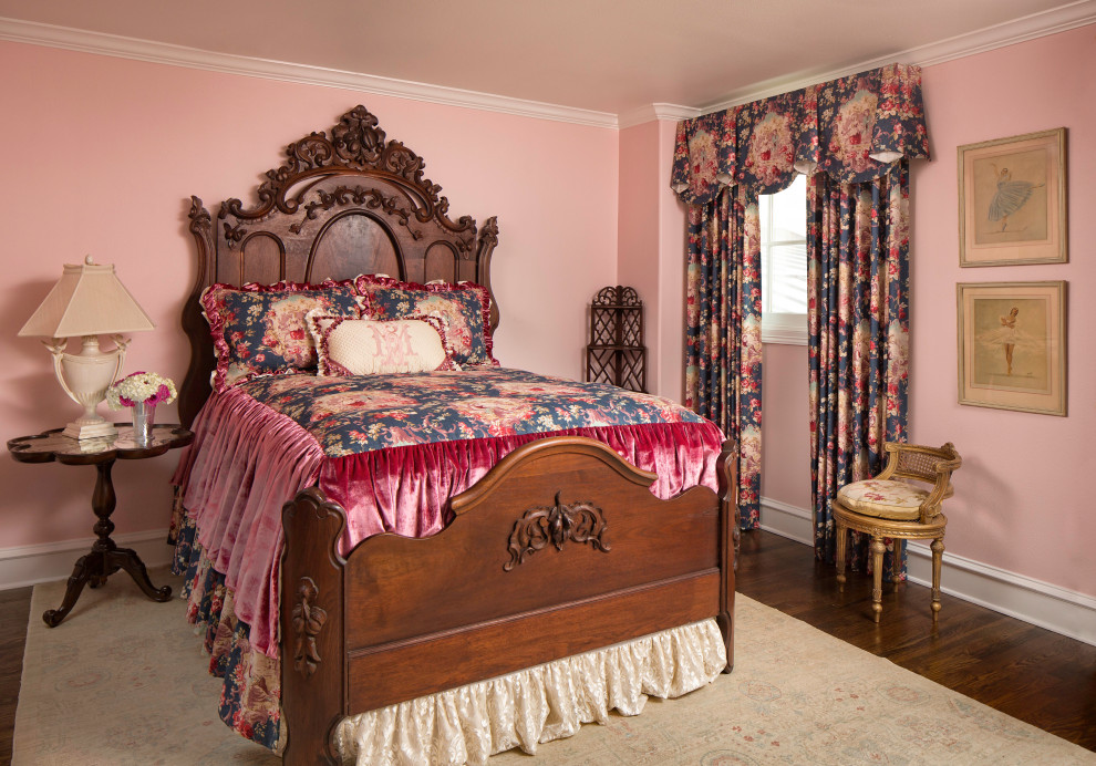 Design ideas for a traditional bedroom in Dallas with pink walls, medium hardwood floors and brown floor.
