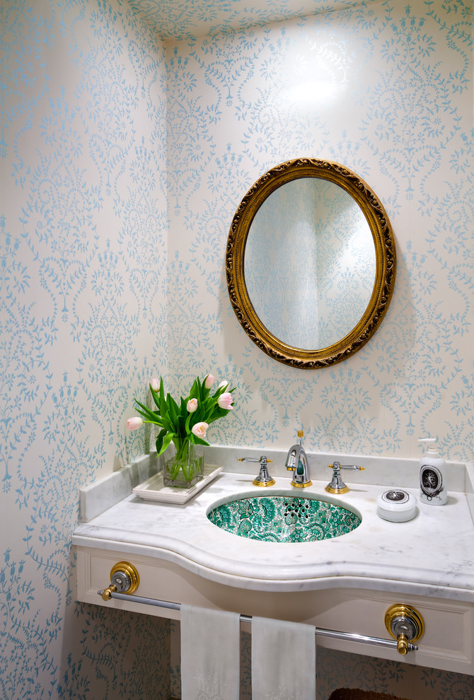 Design ideas for a traditional powder room in Toronto with an undermount sink.