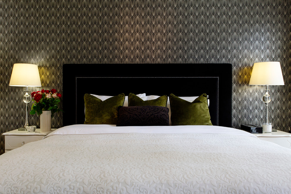 This is an example of a small traditional master bedroom in Melbourne with white walls and carpet.