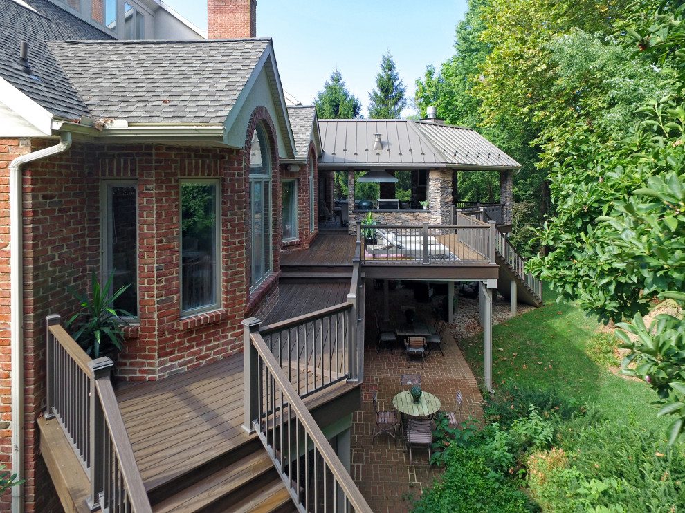 Deck - transitional backyard second story metal railing deck idea