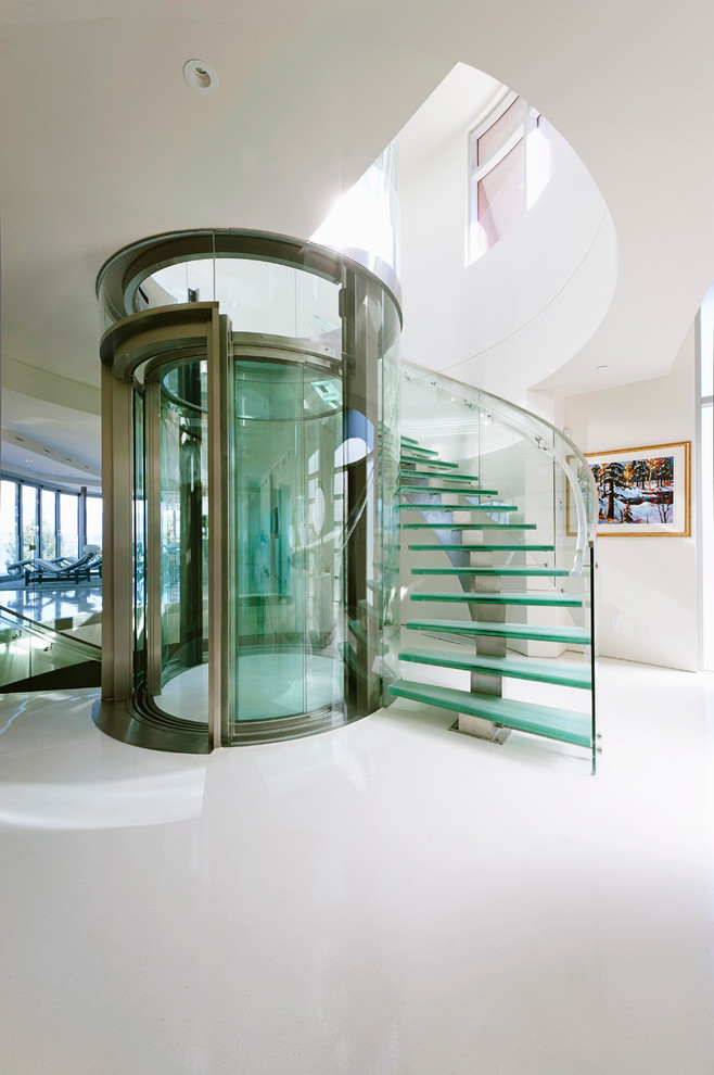 This is an example of a contemporary staircase in Vancouver with open risers.