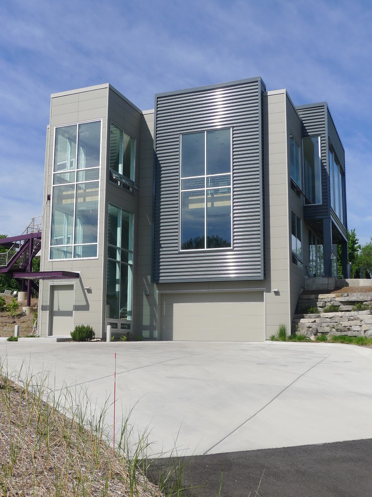 Design ideas for a modern exterior in Chicago with metal siding.