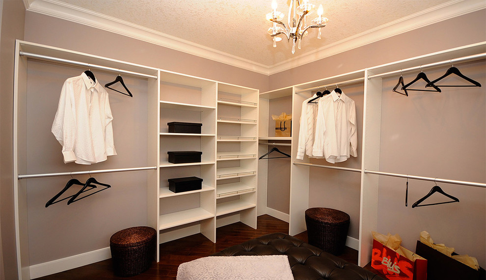 Inspiration for a large contemporary men's walk-in wardrobe in Edmonton with open cabinets, white cabinets and dark hardwood floors.