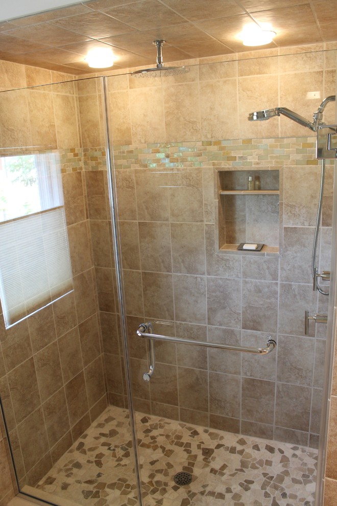 This is an example of a mid-sized beach style bathroom in New York with beige tile, an alcove shower, ceramic tile, beige walls and ceramic floors.