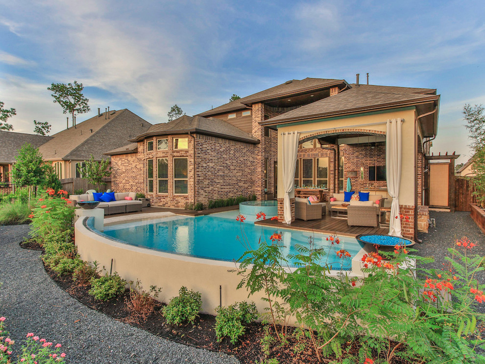 Inspiration for a large transitional backyard concrete and rectangular natural hot tub remodel in Houston