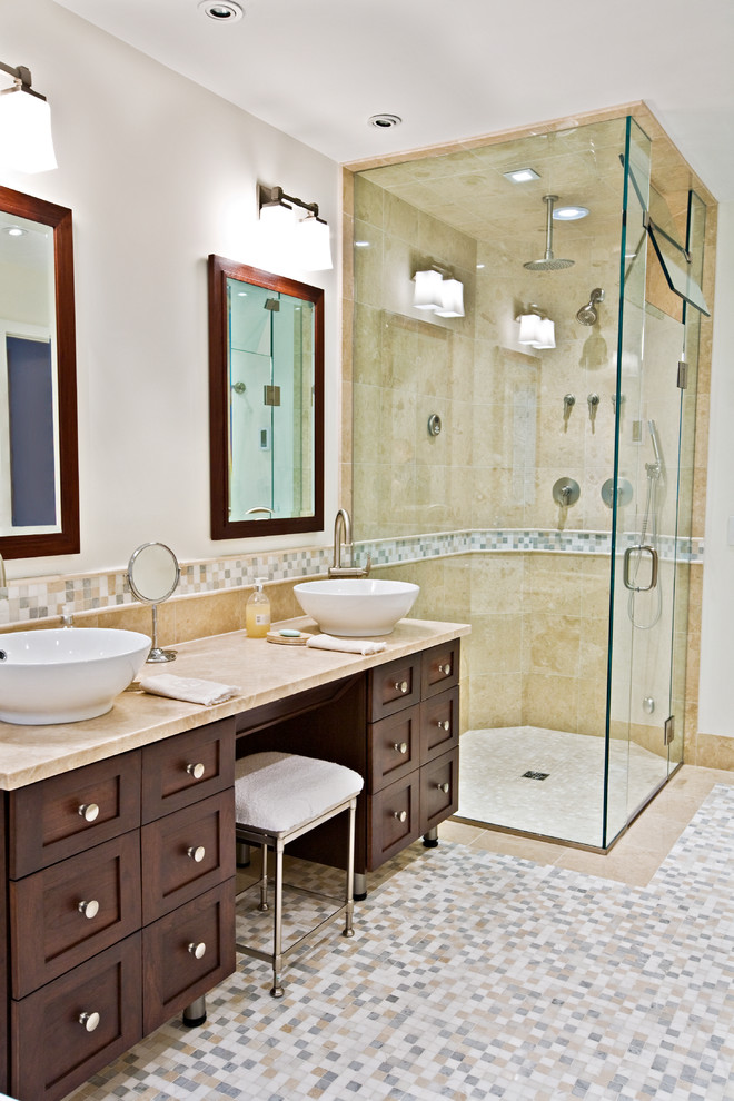 Large contemporary master bathroom in Bridgeport with a vessel sink, furniture-like cabinets, dark wood cabinets, marble benchtops, a freestanding tub, a curbless shower, a two-piece toilet, beige tile, porcelain tile, white walls and mosaic tile floors.