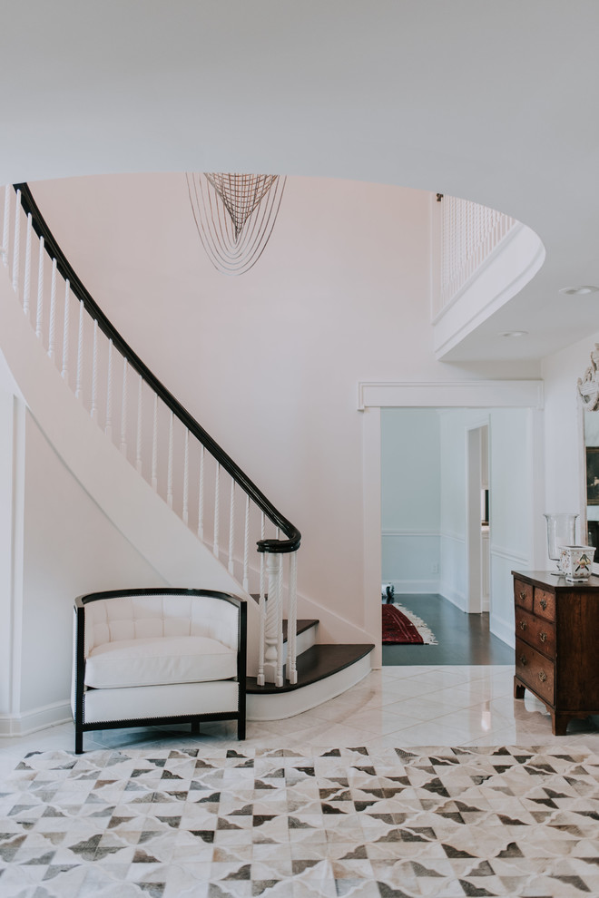 Inspiration for a transitional dark wood floor and brown floor entryway remodel in Cleveland with blue walls