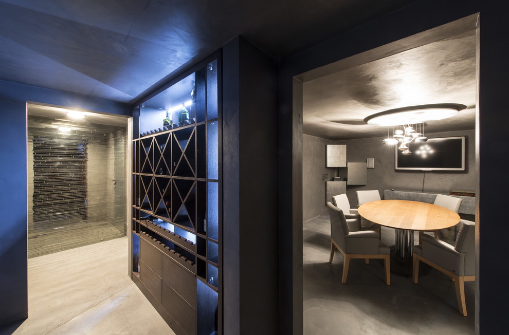 Design ideas for a mid-sized contemporary wine cellar in Moscow with marble floors and display racks.