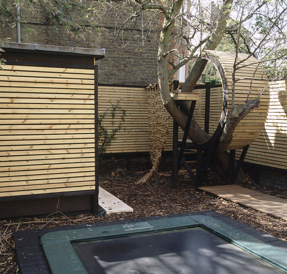 Photo of a contemporary garden shed and building in London.