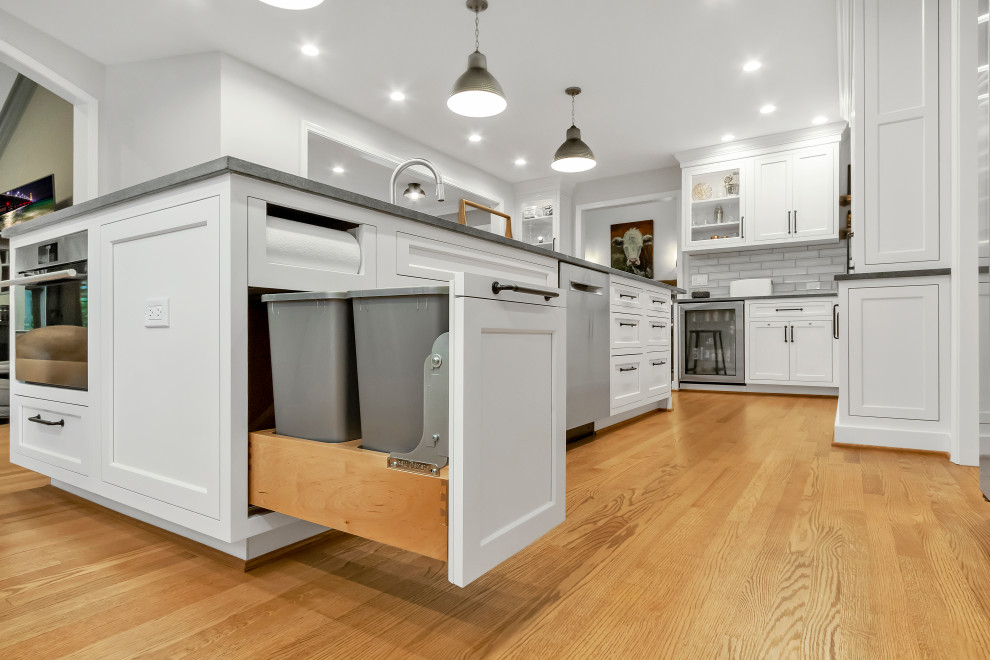 Example of a huge transitional home design design in Detroit