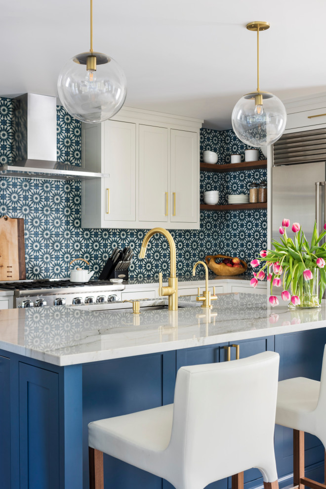 Design ideas for a mid-sized contemporary open plan kitchen in New York with shaker cabinets, blue cabinets, quartzite benchtops, with island, an undermount sink, blue splashback, stainless steel appliances and white benchtop.
