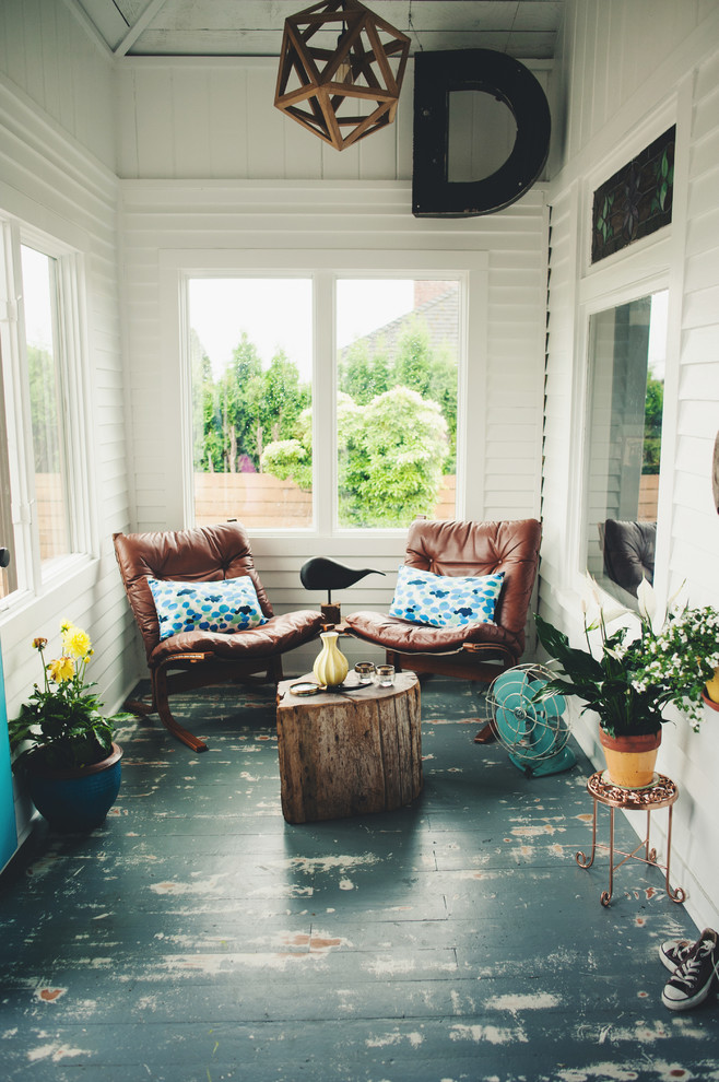 Inspiration for a small beach style sunroom in Seattle with blue floor.