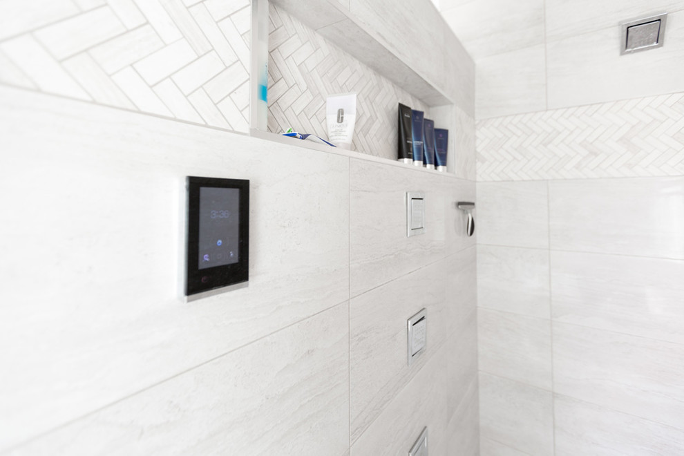 Transitional master beige tile beige floor bathroom photo with flat-panel cabinets, medium tone wood cabinets and a vessel sink