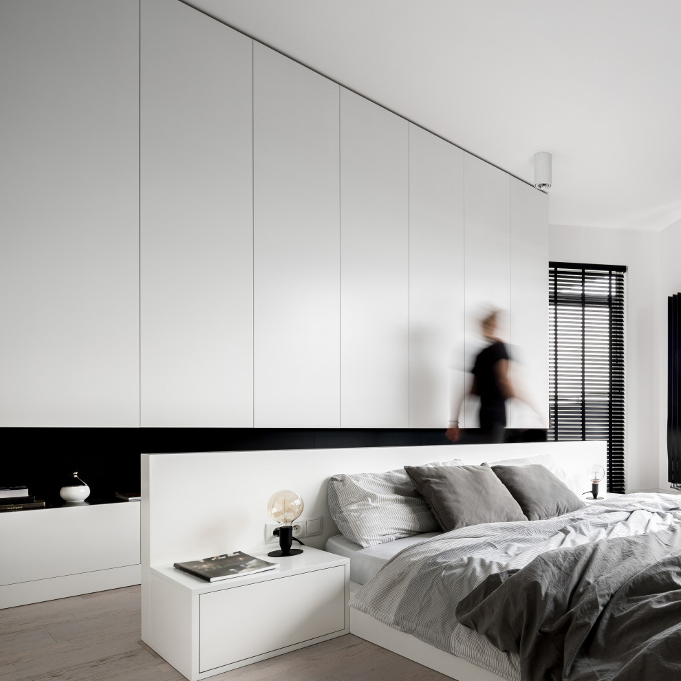 Foto de dormitorio principal y blanco moderno