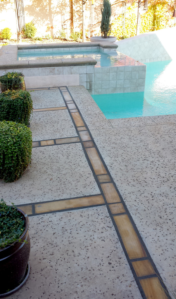Hot tub - mid-sized transitional backyard tile and rectangular lap hot tub idea