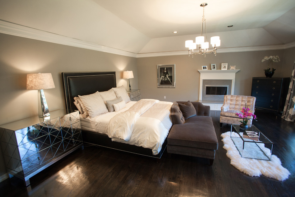 Transitional dark wood floor bedroom photo in New York with gray walls and a standard fireplace