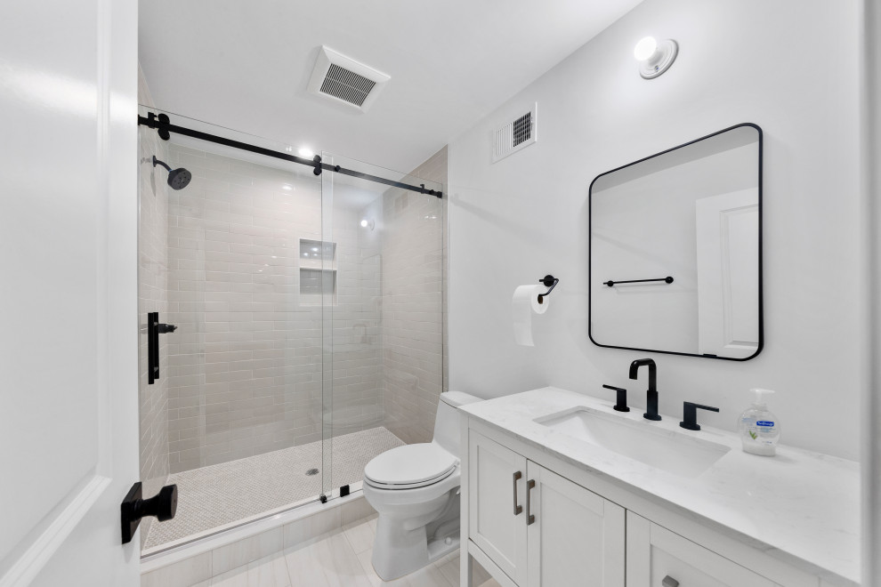Bathroom with Walk-In Shower and Black Accents
