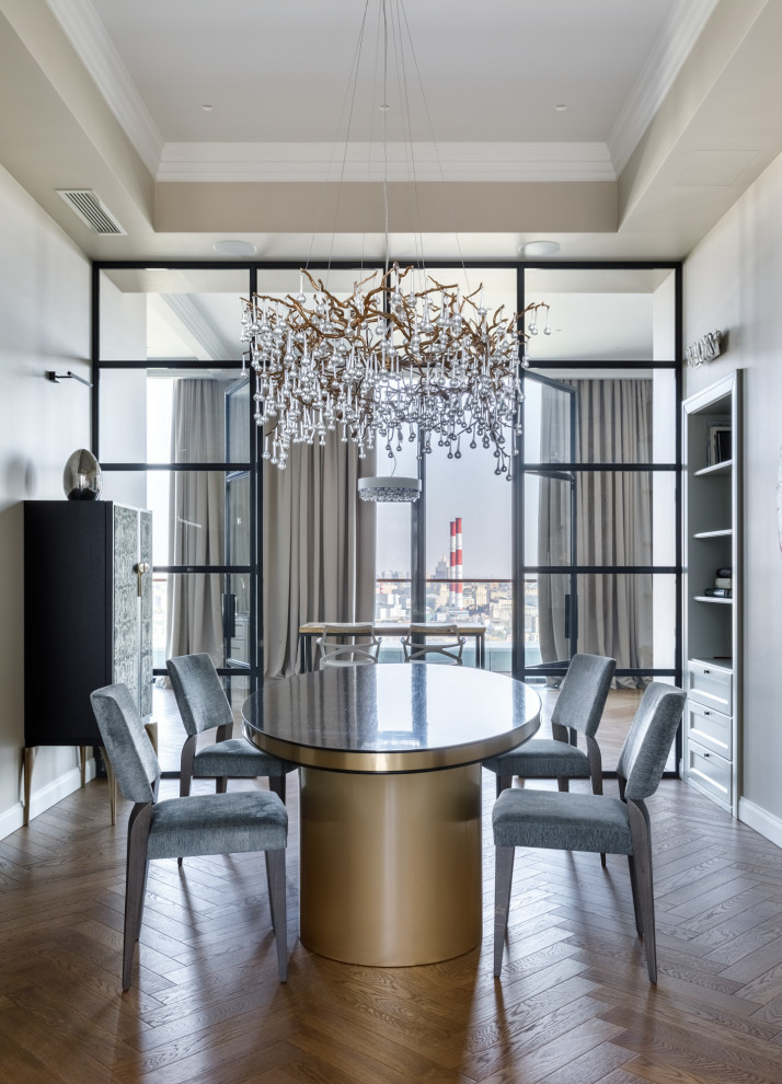 Photo of a contemporary separate dining room in Moscow with grey walls, medium hardwood floors and recessed.