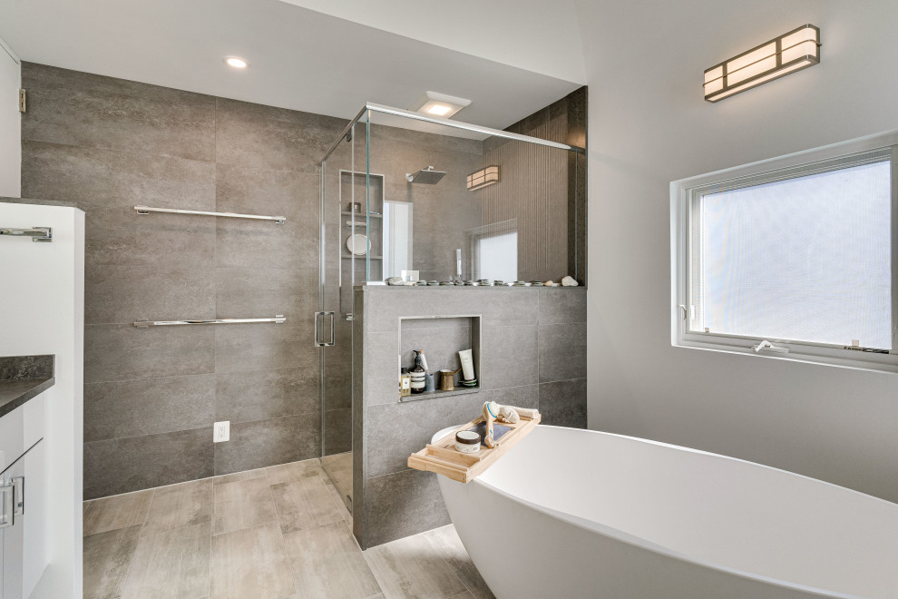 This is an example of a large contemporary master bathroom in DC Metro with flat-panel cabinets, white cabinets, a corner shower, concrete benchtops, a hinged shower door, a niche, a double vanity and a floating vanity.