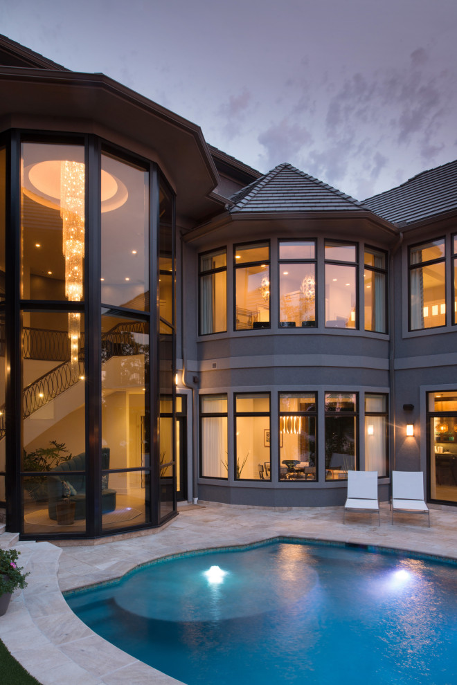 Inspiration for a transitional pool remodel in Kansas City