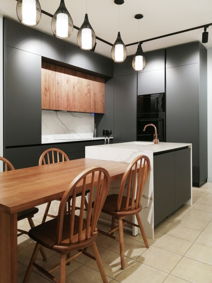 Современная кухня со столом островом