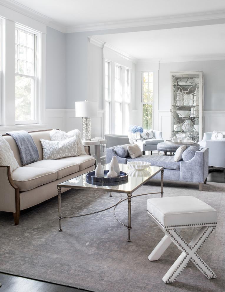 Living room - mid-sized coastal formal and enclosed dark wood floor and brown floor living room idea in New York with blue walls, a standard fireplace, a stone fireplace and no tv
