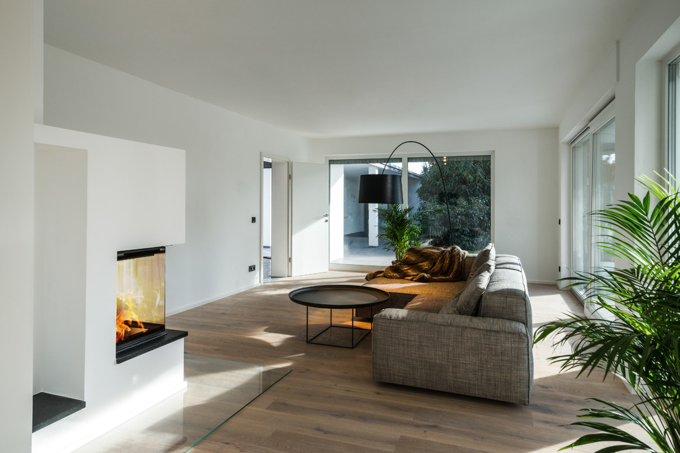 Transitional family room in Munich.