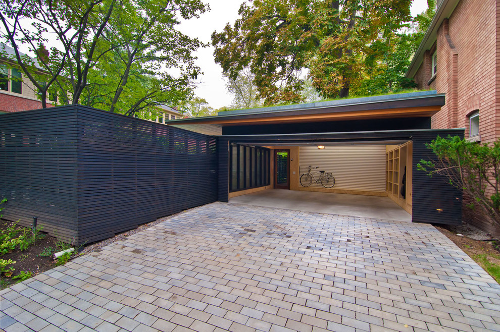 This is an example of a mid-sized modern detached two-car garage in Toronto.