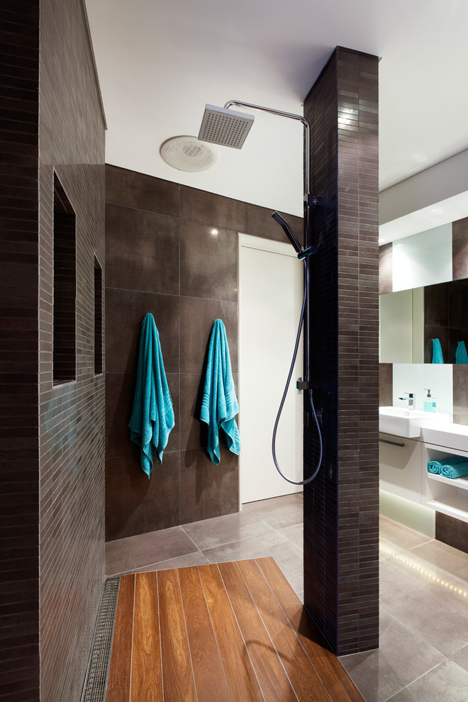 This is an example of a contemporary 3/4 bathroom in Other with a drop-in sink, flat-panel cabinets, white cabinets, an open shower, gray tile, grey walls and an open shower.