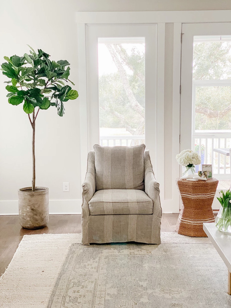 Inspiration for a beach style living room in Charleston.