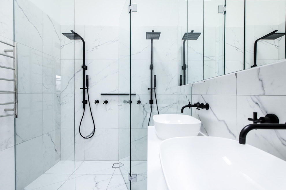 This is an example of a contemporary bathroom in Melbourne with a hinged shower door.