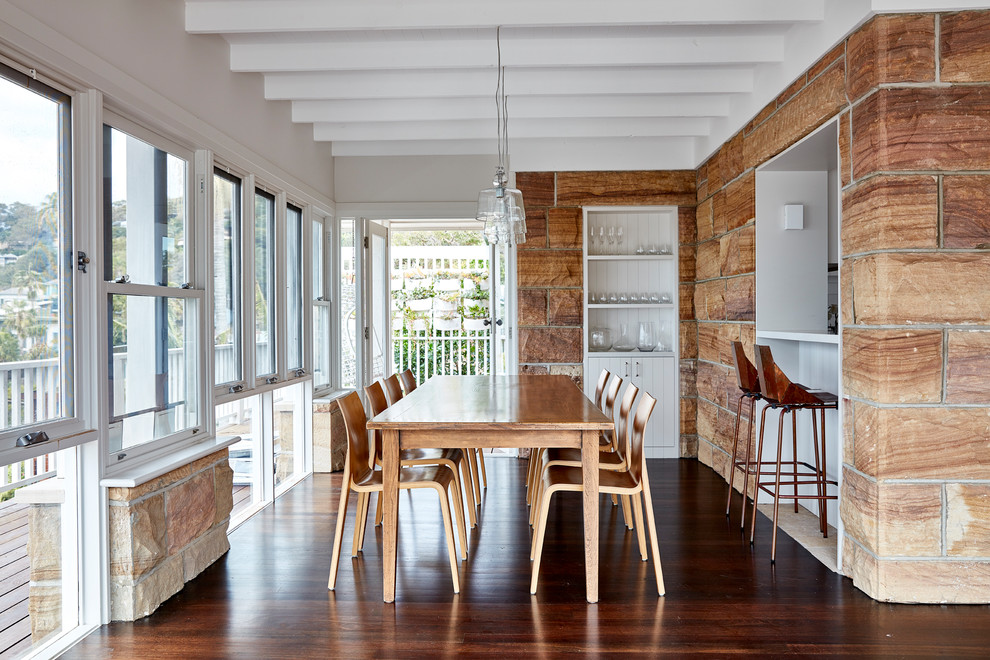 Design ideas for a beach style dining room in Sydney.