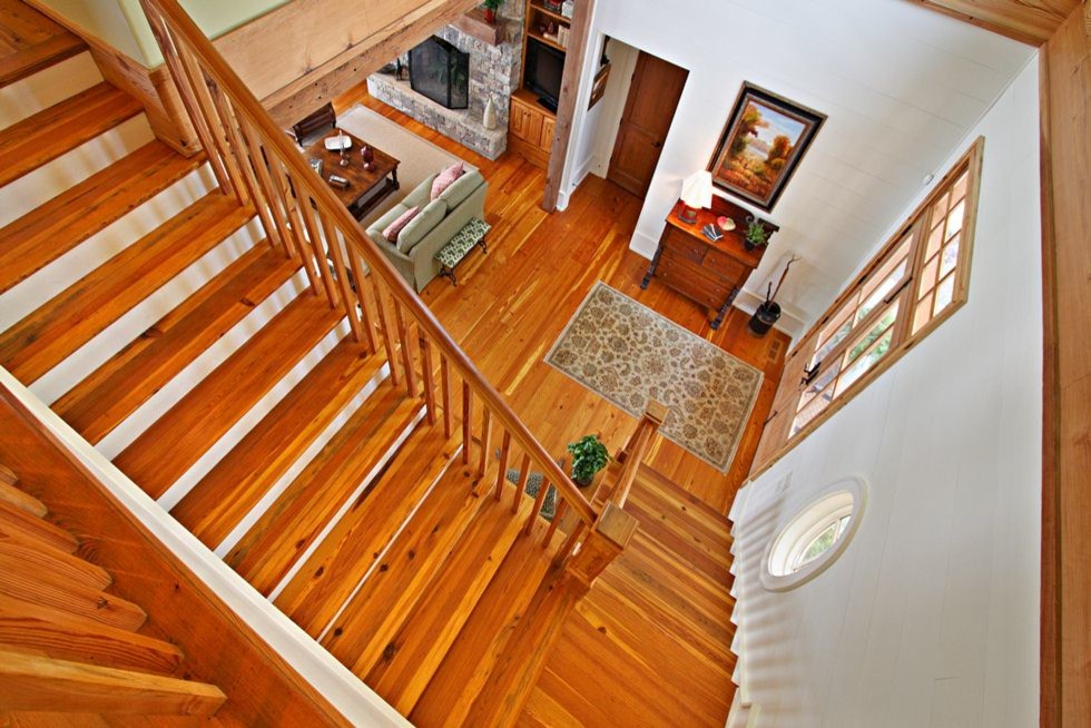 Design ideas for a traditional wood l-shaped staircase in Atlanta with painted wood risers.
