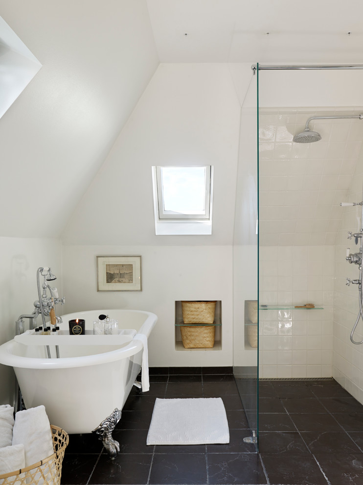 Photo of a small contemporary master bathroom in Copenhagen with a pedestal sink, a freestanding tub, an open shower, white tile, porcelain tile and white walls.