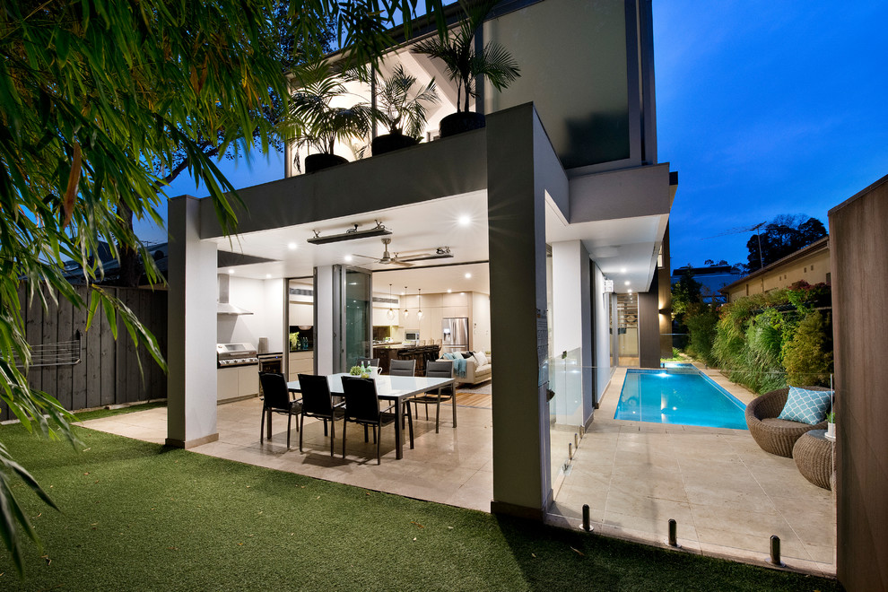Design ideas for a contemporary two-storey grey house exterior in Sydney.