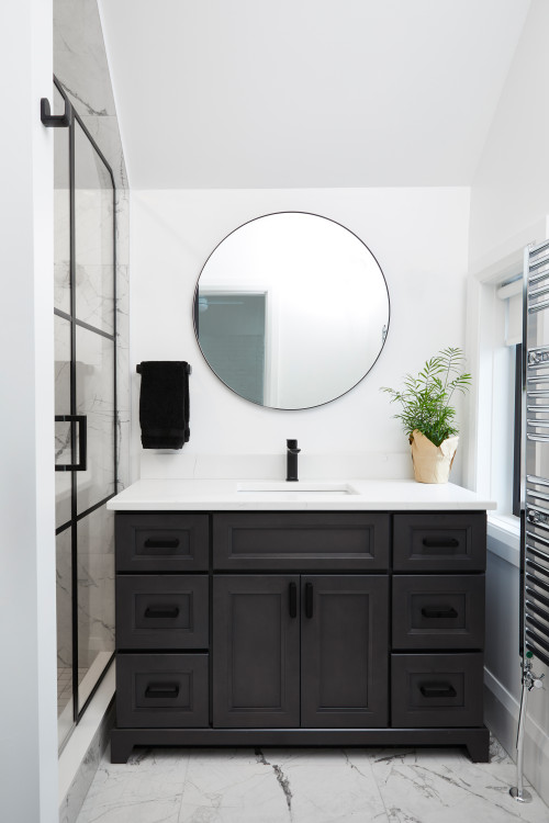Bold Contrast: Black Shaker Vanity with Round Mirror and Luxurious Marble Floor Bathroom Mirror Ideas