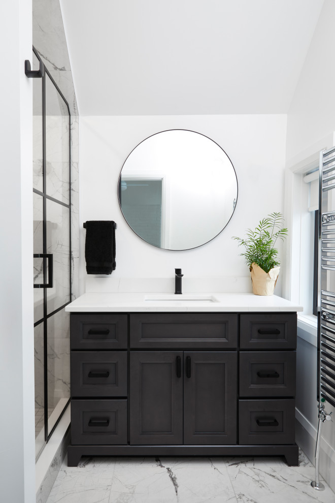 This is an example of a small transitional master bathroom in Toronto with shaker cabinets, grey cabinets, a one-piece toilet, porcelain tile, white walls, ceramic floors, an undermount sink, quartzite benchtops, white floor, a hinged shower door, white benchtops, a niche, a double vanity and a built-in vanity.
