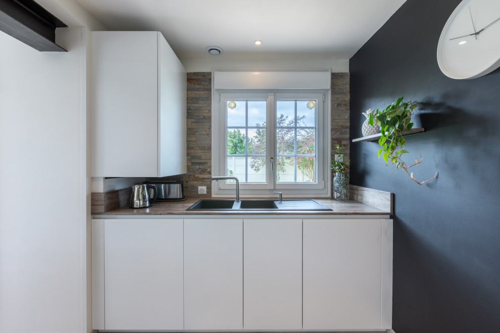 Rénovation complète d'une cuisine, abattement d'un mur porteur