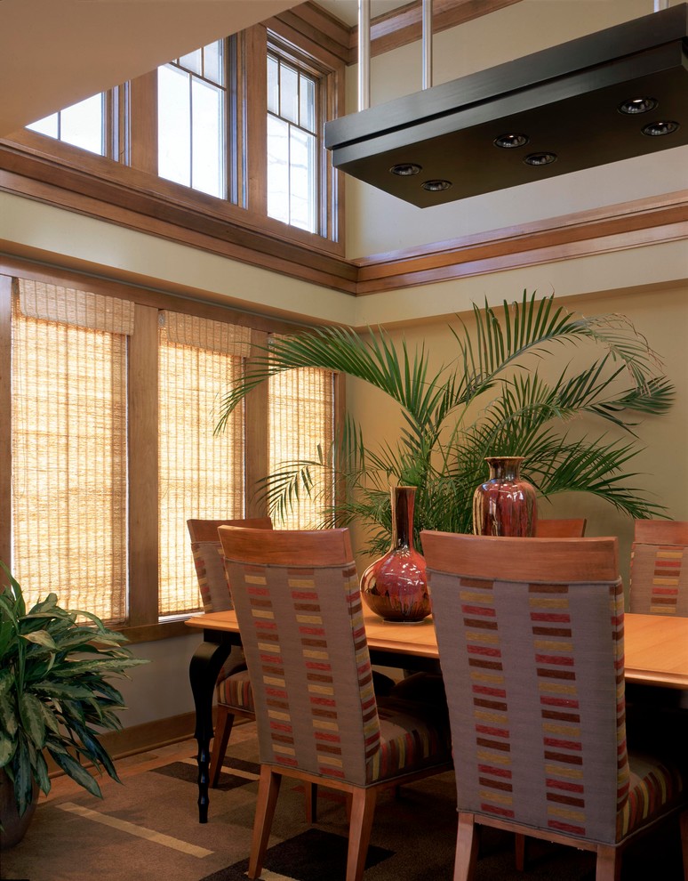 Design ideas for a tropical dining room in Omaha.