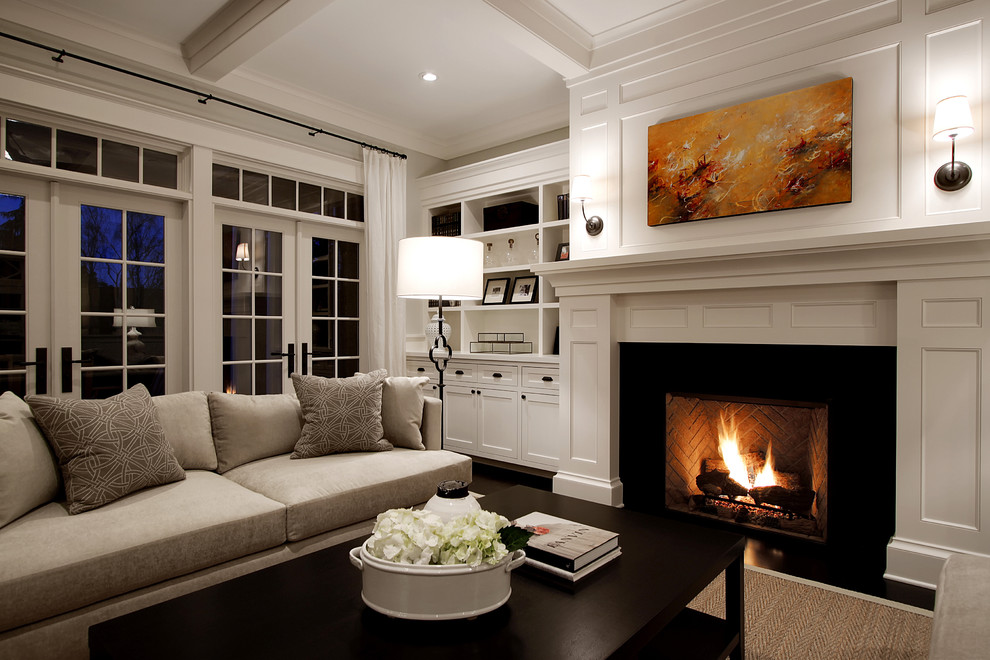 Inspiration for a large traditional living room in Seattle with white walls and a standard fireplace.