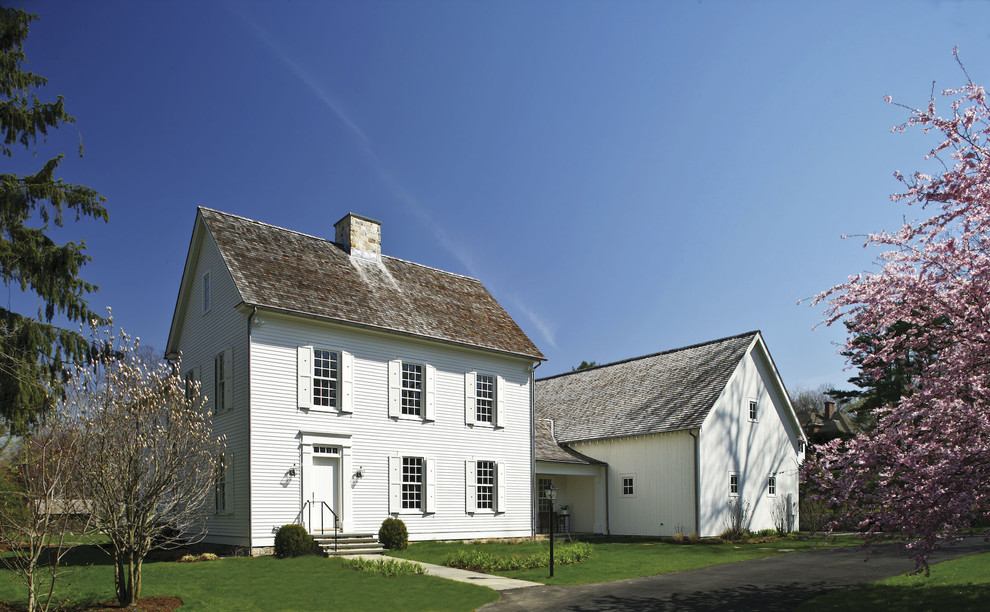Photo of a country exterior in New York with wood siding.
