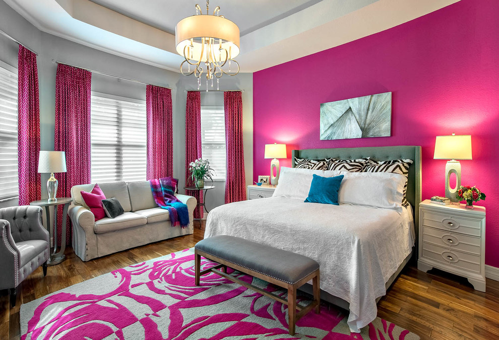 Design ideas for a contemporary bedroom in Philadelphia with pink walls, dark hardwood floors and brown floor.