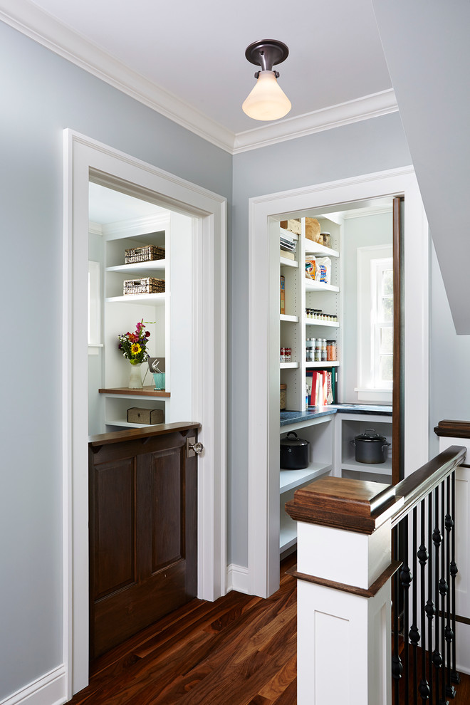 Kitchen pantry - small transitional dark wood floor kitchen pantry idea in Minneapolis with white cabinets, open cabinets and laminate countertops