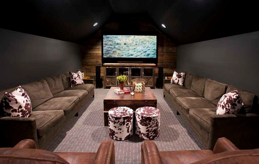 Inspiration for a mid-sized country enclosed home theatre in Nashville with carpet and a built-in media wall.